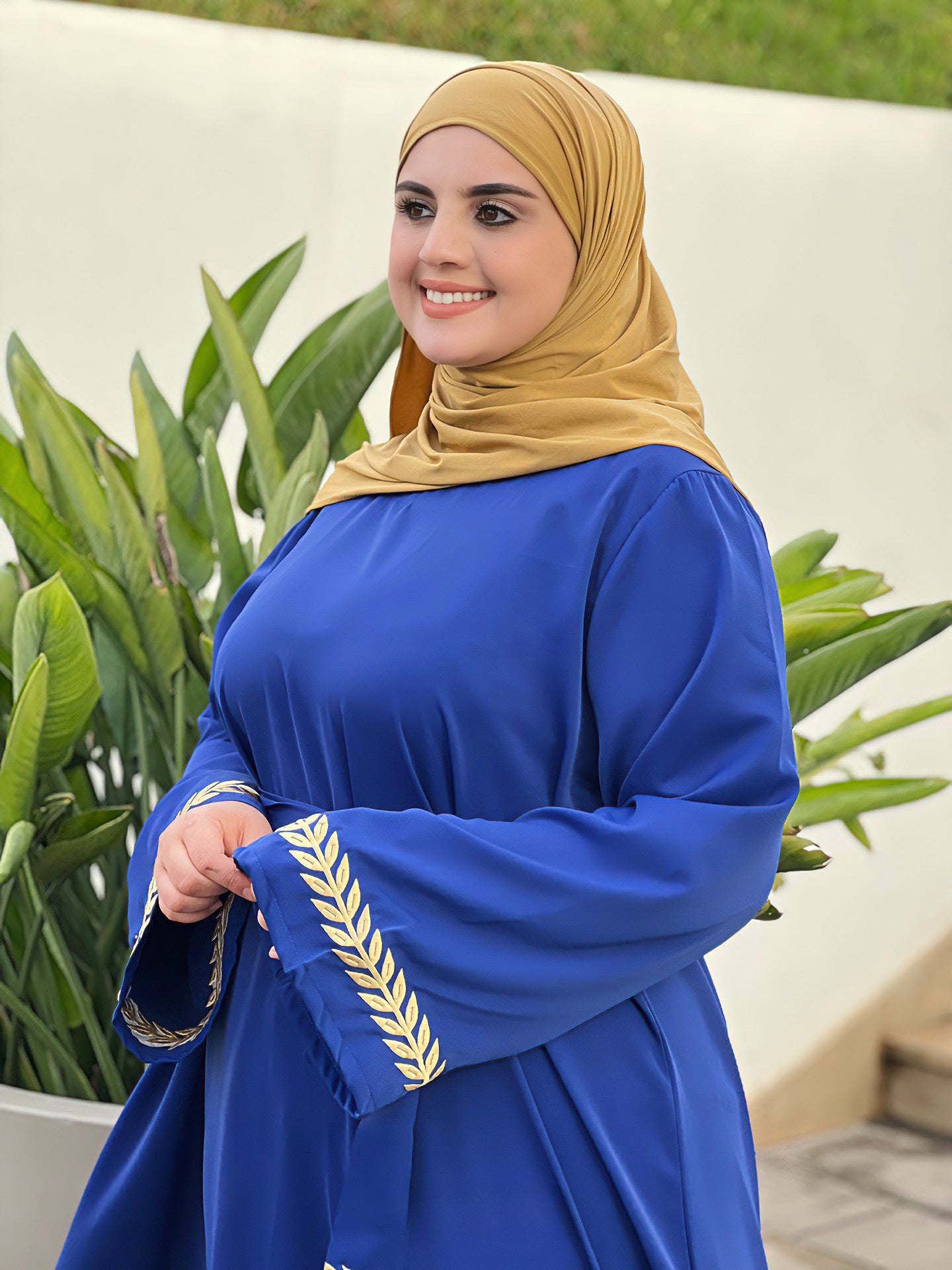 كسوة بالطّرزة والحزام