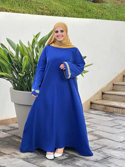 كسوة بالطّرزة والحزام