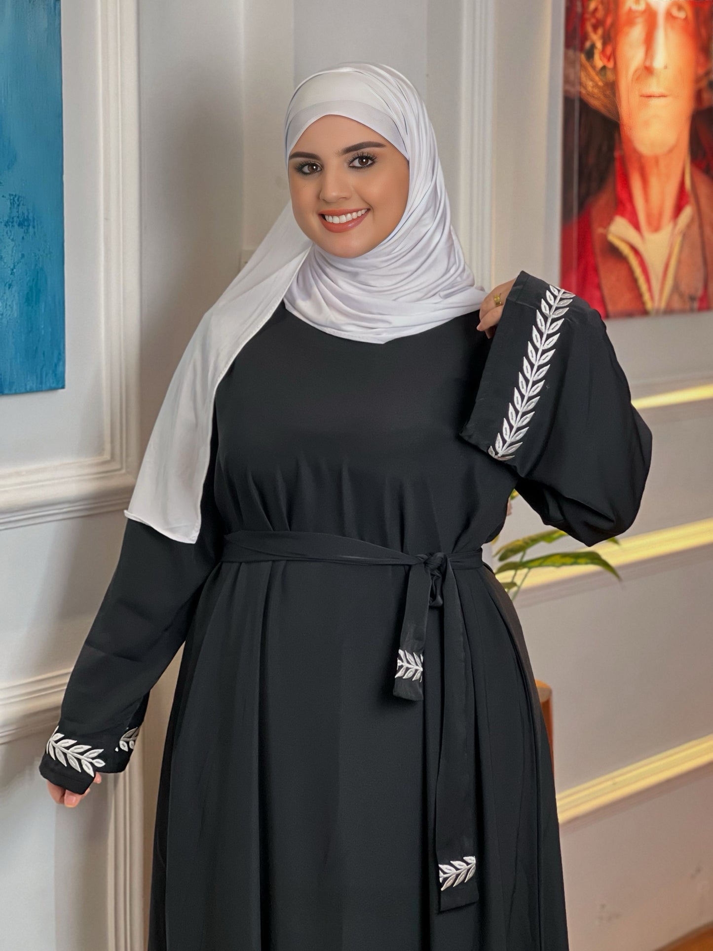 كسوة بالطّرزة والحزام