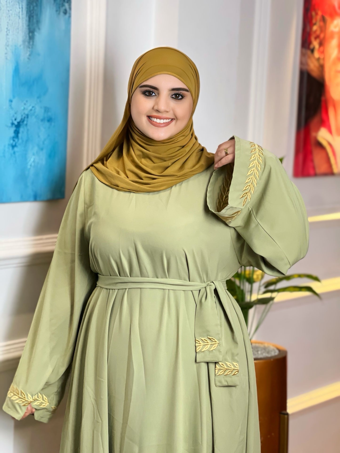 كسوة بالطّرزة والحزام