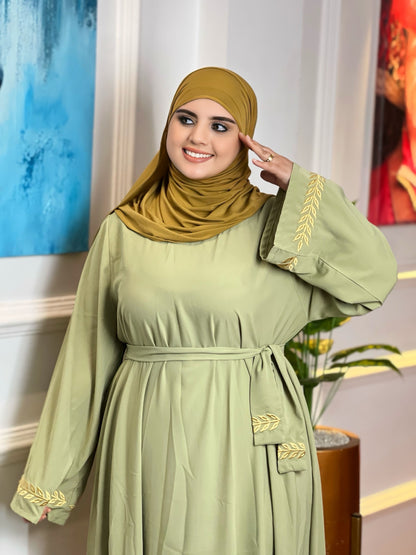 كسوة بالطّرزة والحزام